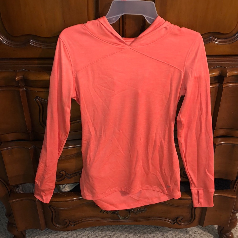 Neon orange long sleeved workout top